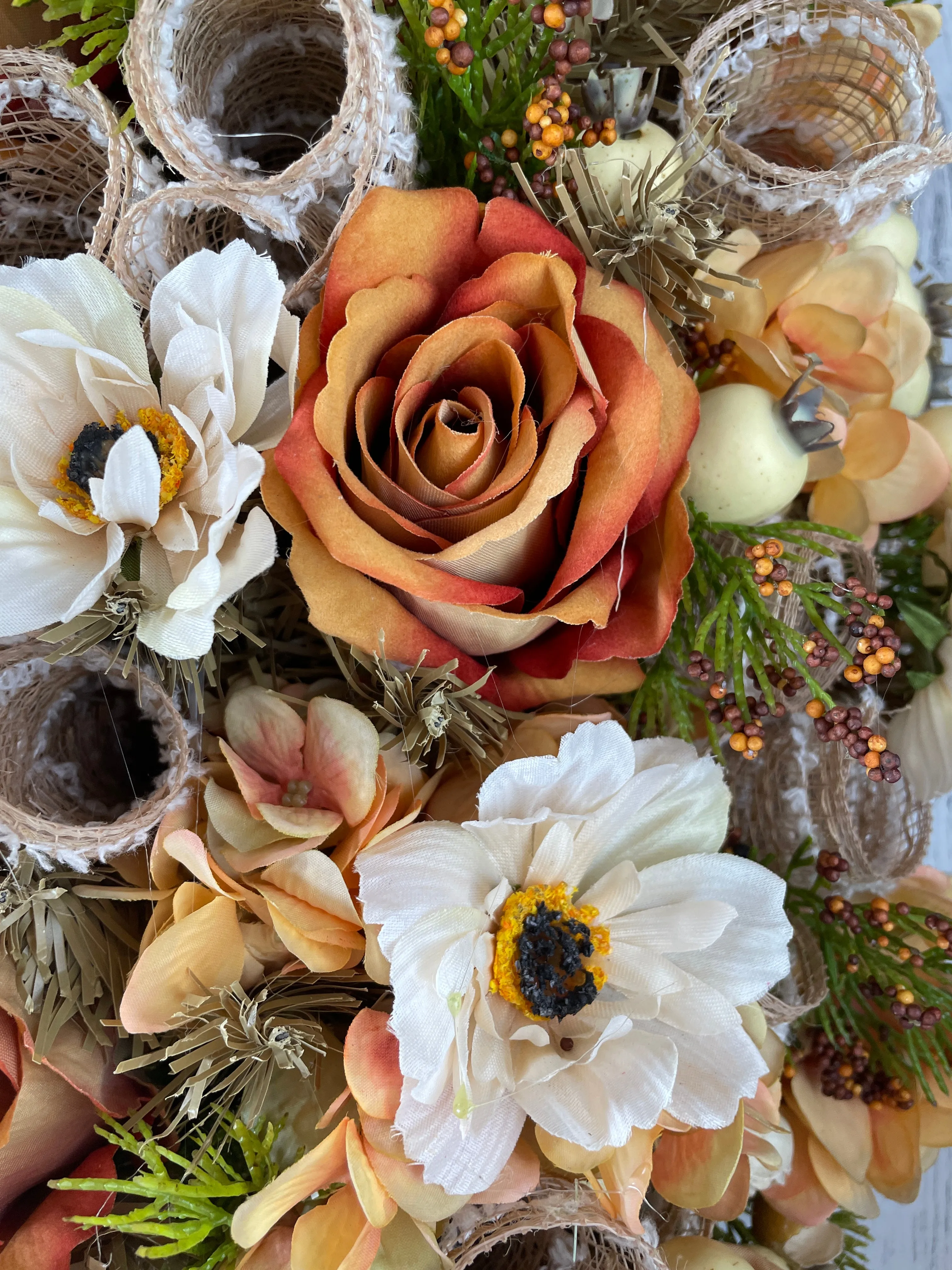 Orange floral swag for door