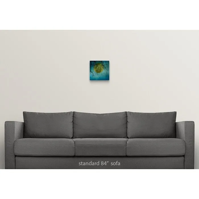 "A huge full moon behind bare winter branches." Canvas Wall Art