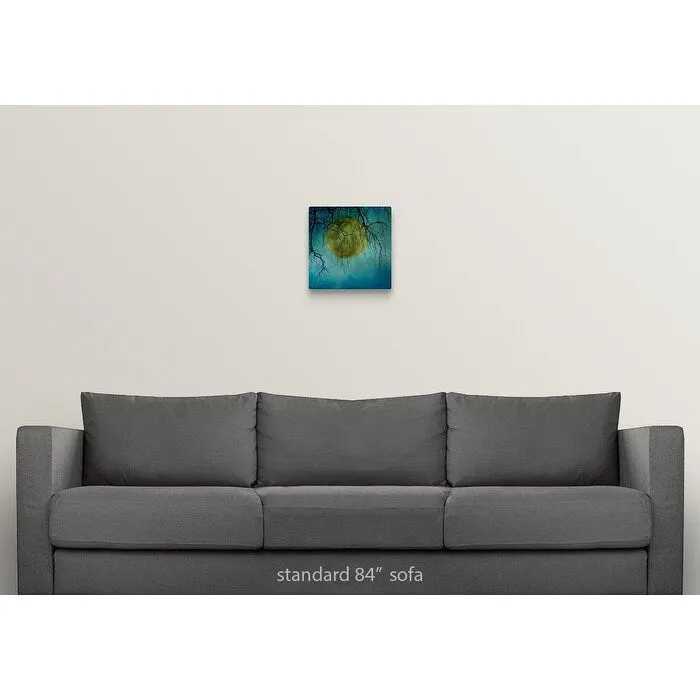 "A huge full moon behind bare winter branches." Canvas Wall Art