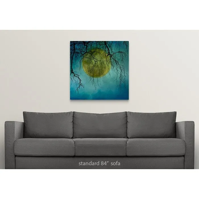 "A huge full moon behind bare winter branches." Canvas Wall Art